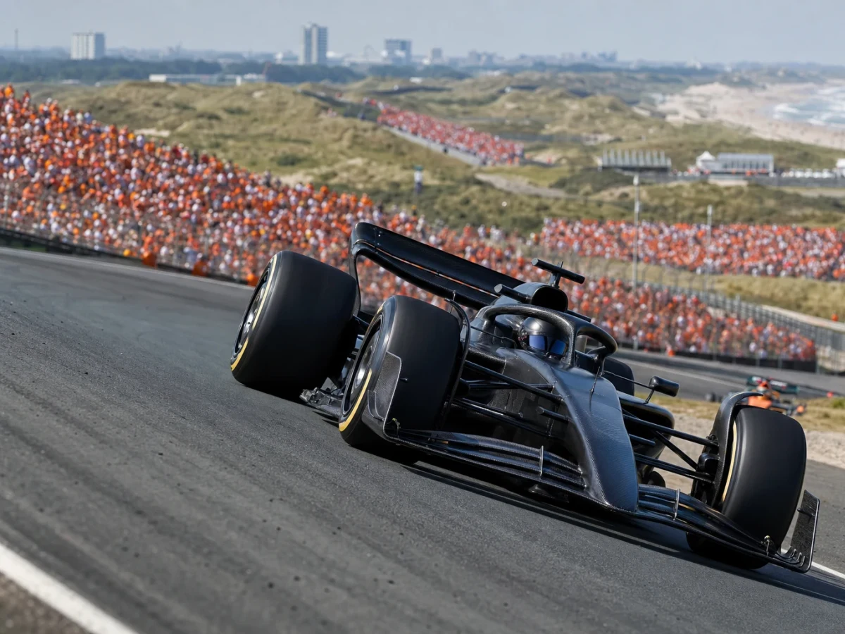 Illustration: f1-bil i en doserad kurva på Circuit Zandvoort under Nederländernas Grand Prix